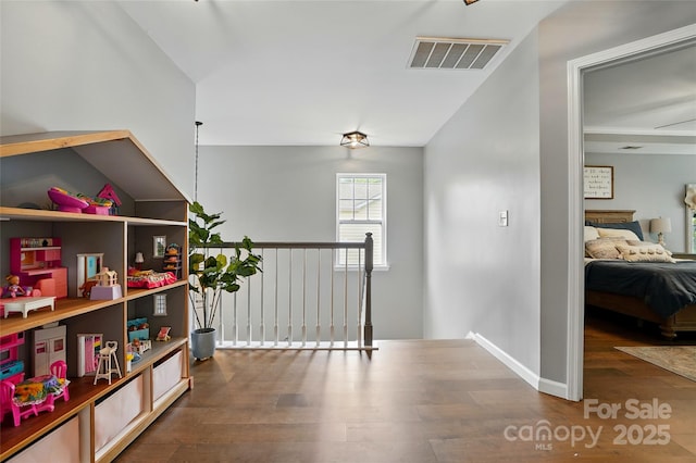 147 Whitley Mills Rd, Fort Mill, SC 29708 - hall featuring wood finished floors and an upstairs landing