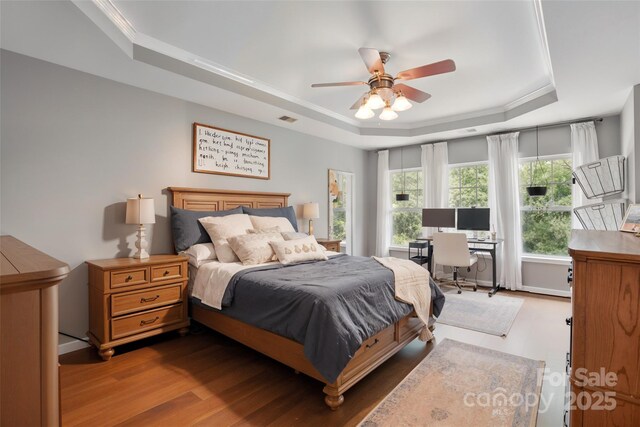 147 Whitley Mills Rd, Fort Mill, SC 29708 - bedroom featuring a raised ceiling, wood finished floors, an office area, ornamental molding, and ceiling fan