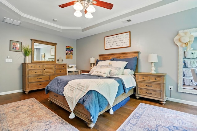 147 Whitley Mills Rd, Fort Mill, SC 29708 - bedroom featuring wood finished floors, a tray ceiling, baseboards, ceiling fan, and crown molding