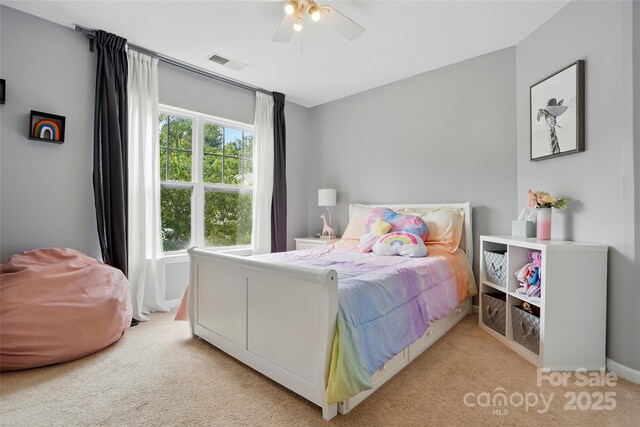 147 Whitley Mills Rd, Fort Mill, SC 29708 - carpeted bedroom featuring multiple windows, baseboards, and ceiling fan