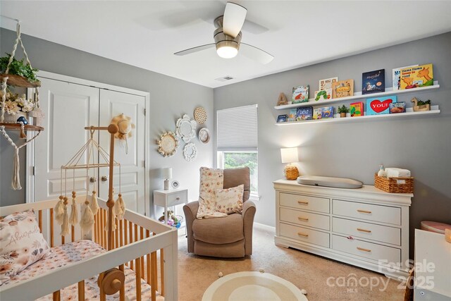 147 Whitley Mills Rd, Fort Mill, SC 29708 - bedroom featuring light colored carpet, a closet, and a ceiling fan
