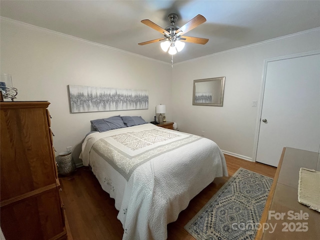 311 Tiffany St NW, Concord, NC 28027 - bedroom featuring wood finished floors, crown molding, baseboards, and a ceiling fan