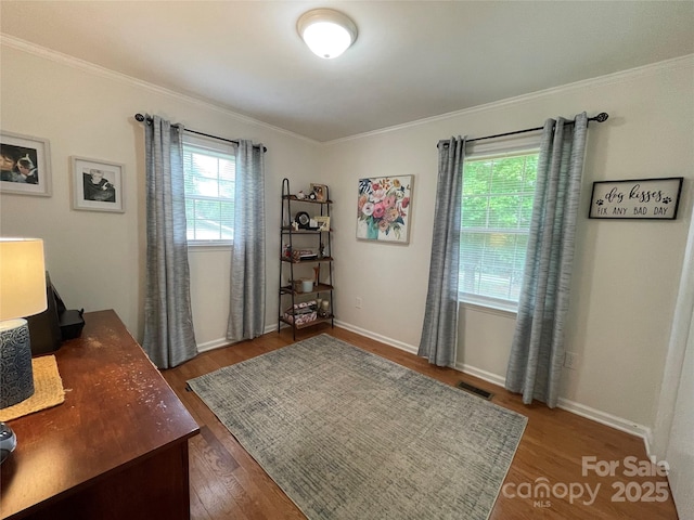311 Tiffany St NW, Concord, NC 28027 - home office featuring wood finished floors, crown molding, and baseboards