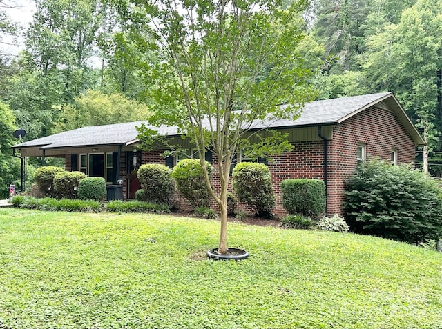 3503 Wyndham Ln, Lenoir, NC 28645 - ranch-style house with a front yard and brick siding