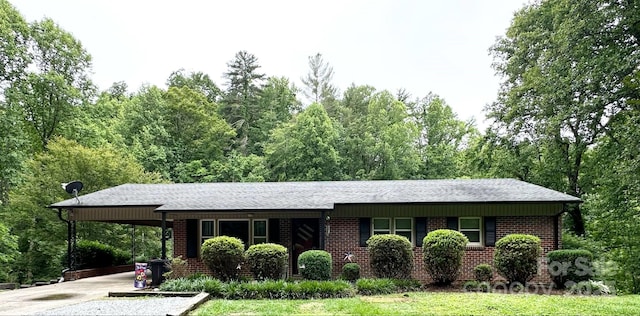 3503 Wyndham Ln, Lenoir, NC 28645 - view of front of home with an attached carport, driveway, and brick siding