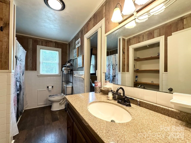 3503 Wyndham Ln, Lenoir, NC 28645 - full bathroom featuring toilet, wood finished floors, vanity, tile walls, and curtained shower