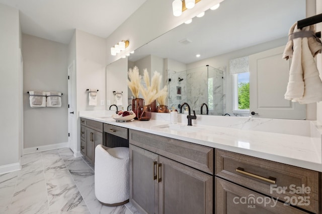18129 Sulton Ter, Huntersville, NC 28078 - full bathroom featuring double vanity, a marble finish shower, marble finish floors, and baseboards