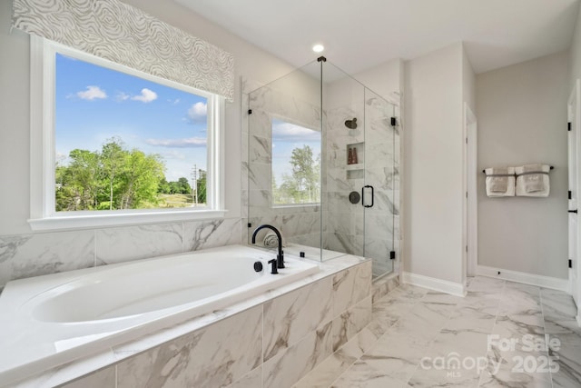 18129 Sulton Ter, Huntersville, NC 28078 - full bath with a garden tub, a marble finish shower, marble finish floors, and baseboards