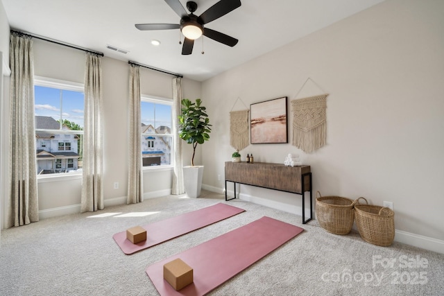 18129 Sulton Ter, Huntersville, NC 28078 - workout area with a ceiling fan, carpet, and baseboards