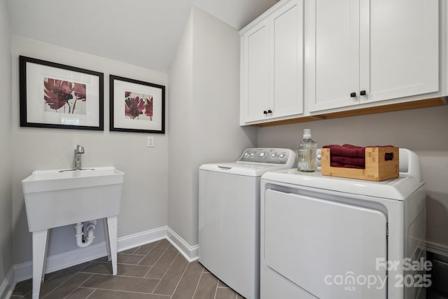 18129 Sulton Ter, Huntersville, NC 28078 - laundry room featuring cabinet space, independent washer and dryer, and baseboards