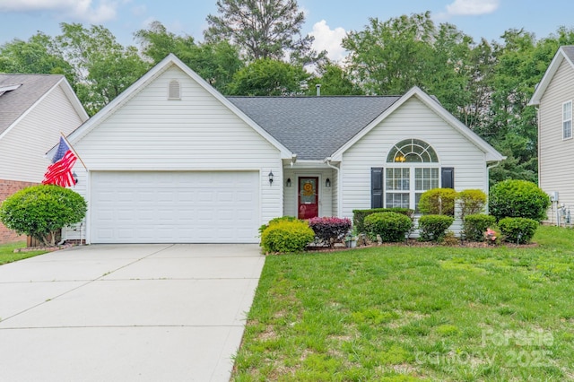 199 Ashmont Dr, Kannapolis, NC 28081 - view of front facade featuring a garage, driveway, a front yard, and a shingled roof