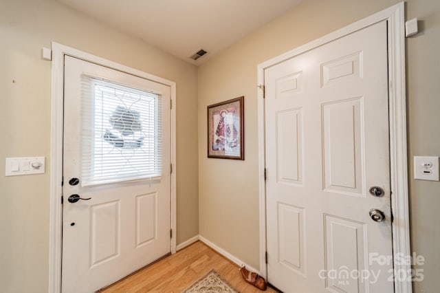 199 Ashmont Dr, Kannapolis, NC 28081 - doorway with light wood-style floors and baseboards