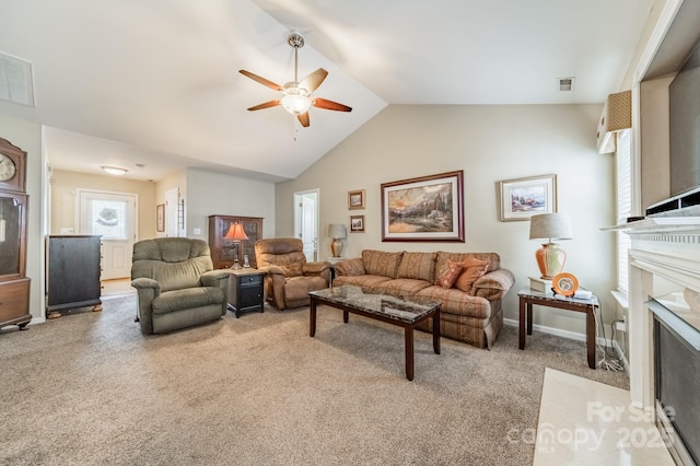 199 Ashmont Dr, Kannapolis, NC 28081 - carpeted living room featuring a ceiling fan, vaulted ceiling, and a premium fireplace