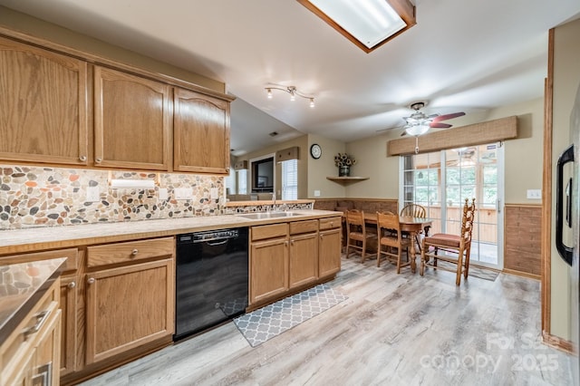 199 Ashmont Dr, Kannapolis, NC 28081 - kitchen with dishwasher, a wainscoted wall, light wood finished floors, light countertops, and a ceiling fan