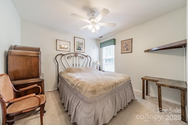 199 Ashmont Dr, Kannapolis, NC 28081 - bedroom with light colored carpet, baseboards, and ceiling fan