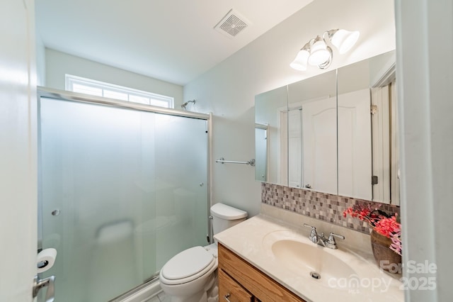 199 Ashmont Dr, Kannapolis, NC 28081 - full bath with a stall shower, vanity, backsplash, and toilet