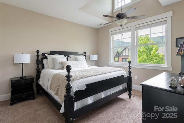 4 Fitzgerald Rd, Black Mountain, NC 28711 - carpeted bedroom with multiple windows, baseboards, and a ceiling fan