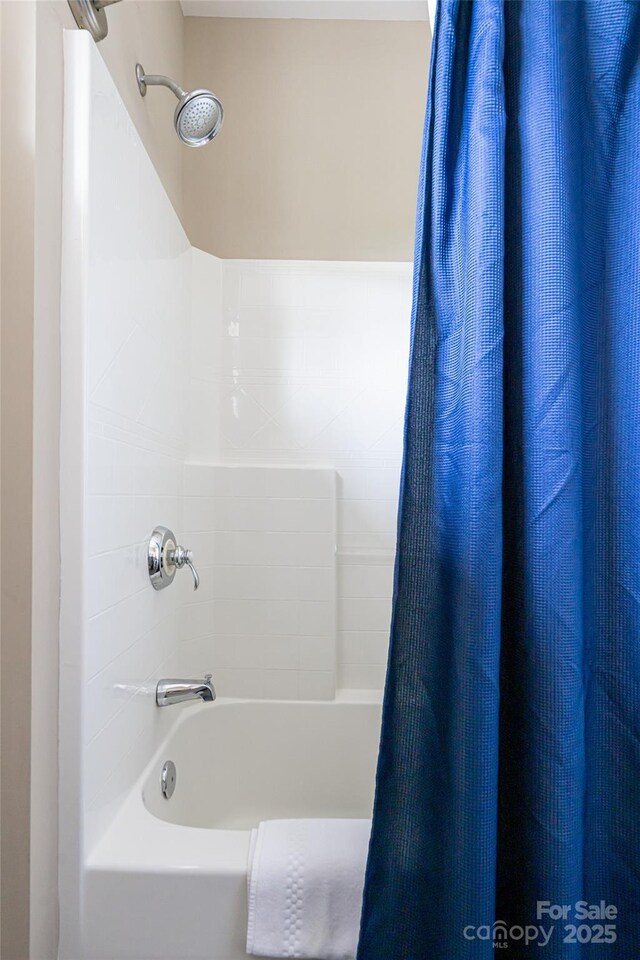 4 Fitzgerald Rd, Black Mountain, NC 28711 - bathroom featuring shower / bath combo with shower curtain