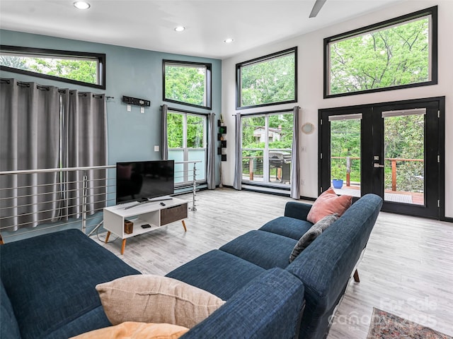 421 Sand Hill Rd, Asheville, NC 28806 - living area featuring wood finished floors, recessed lighting, french doors, and a high ceiling