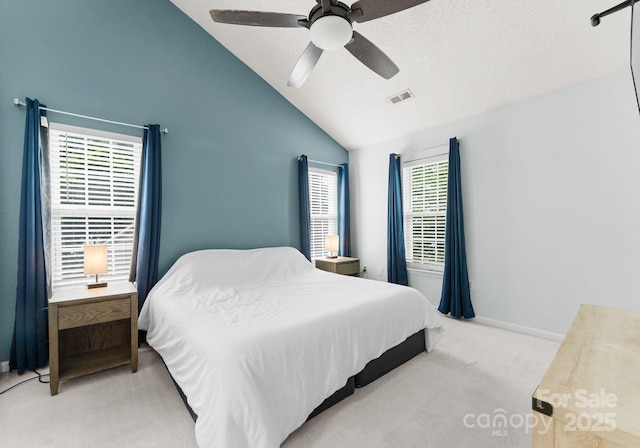 8808 Palmutum Pl, Charlotte, NC 28269 - bedroom featuring carpet floors, ceiling fan, baseboards, and high vaulted ceiling
