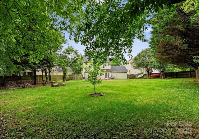 8808 Palmutum Pl, Charlotte, NC 28269 - view of yard with a fire pit