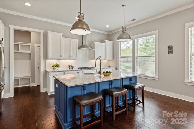 1244 Weir Ct, Fort Mill, SC 29708 - kitchen with wall chimney exhaust hood, a sink, white cabinetry, light stone counters, and recessed lighting