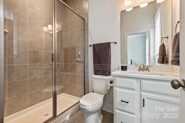1244 Weir Ct, Fort Mill, SC 29708 - bathroom with toilet, vanity, a shower stall, and tile patterned floors