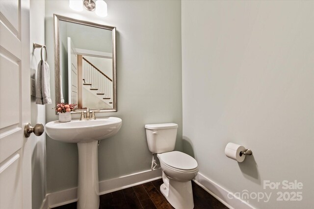 1244 Weir Ct, Fort Mill, SC 29708 - bathroom with baseboards, toilet, and wood finished floors