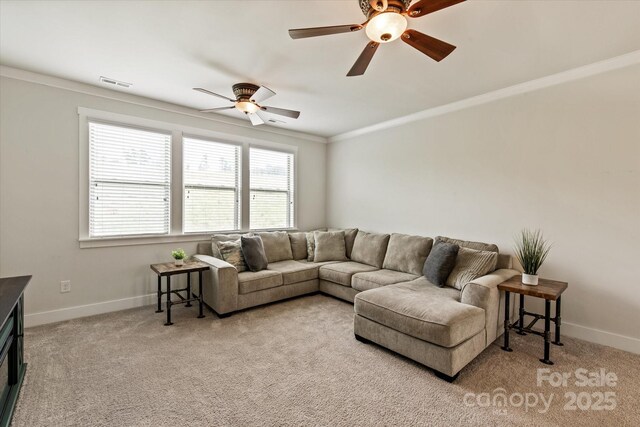 1244 Weir Ct, Fort Mill, SC 29708 - living area with ornamental molding, a ceiling fan, baseboards, and light carpet