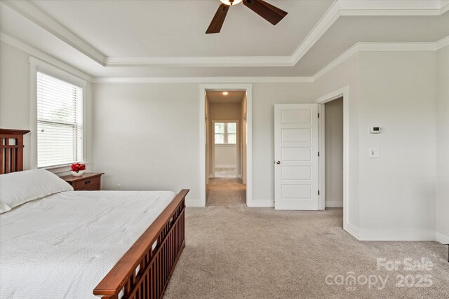 1244 Weir Ct, Fort Mill, SC 29708 - bedroom with light colored carpet, ornamental molding, baseboards, a ceiling fan, and a raised ceiling