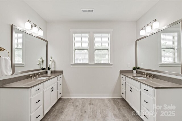 1244 Weir Ct, Fort Mill, SC 29708 - full bathroom with two vanities and baseboards