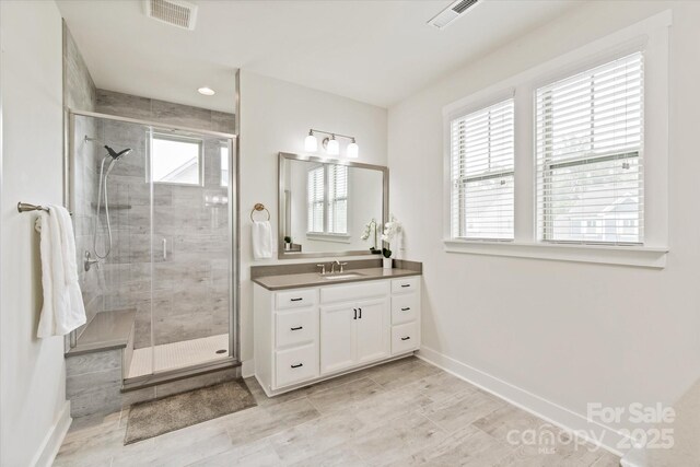1244 Weir Ct, Fort Mill, SC 29708 - bathroom with vanity, a shower stall, and baseboards