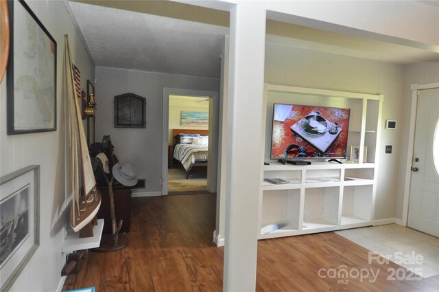 3505 Valley Dr, Chester, SC 29706 - entryway with wood finished floors and crown molding