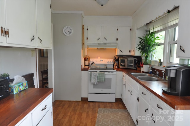 3505 Valley Dr, Chester, SC 29706 - kitchen with white range with electric cooktop, under cabinet range hood, wood counters, a sink, and dark wood-style floors