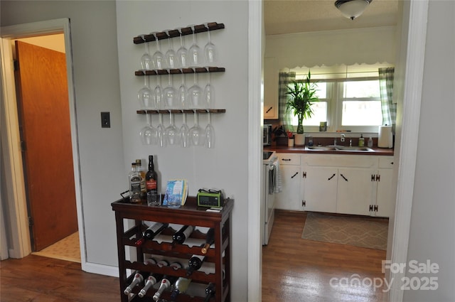 3505 Valley Dr, Chester, SC 29706 - indoor dry bar featuring dark wood finished floors and white electric range