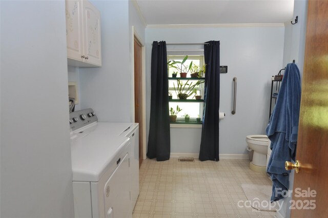 3505 Valley Dr, Chester, SC 29706 - laundry room with washer and dryer, cabinet space, light flooring, crown molding, and baseboards