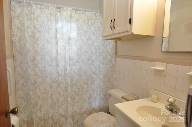3505 Valley Dr, Chester, SC 29706 - bathroom with toilet, tile walls, vanity, a shower with shower curtain, and wainscoting
