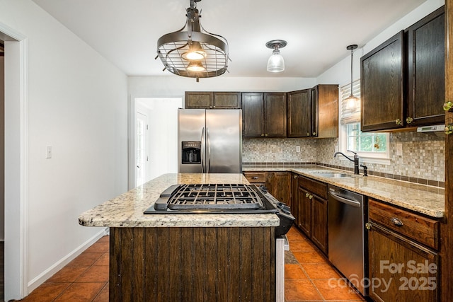 5926 Sharon Rd, Charlotte, NC 28210 - kitchen with appliances with stainless steel finishes, a sink, decorative backsplash, and tile patterned flooring