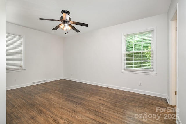 5926 Sharon Rd, Charlotte, NC 28210 - unfurnished room with a ceiling fan, dark wood-style floors, and baseboards