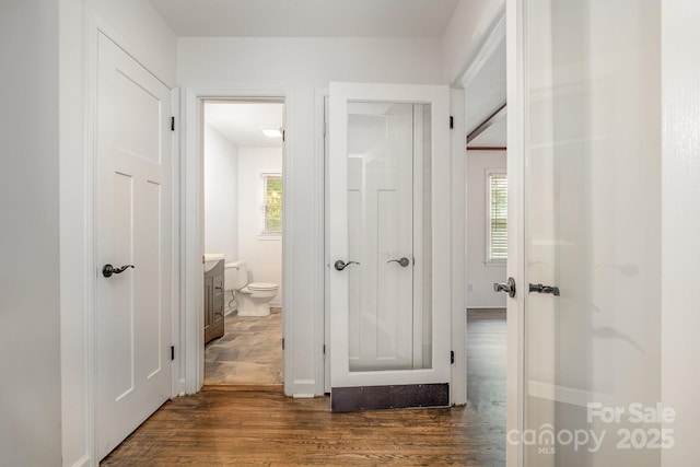 5926 Sharon Rd, Charlotte, NC 28210 - hallway featuring dark wood-style flooring