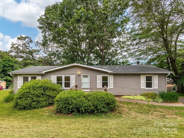 32 Lake Eden Cir, Black Mountain, NC 28711 - view of front of home with a front yard and roof with shingles