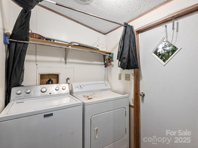 32 Lake Eden Cir, Black Mountain, NC 28711 - laundry area featuring washer and dryer and a textured ceiling