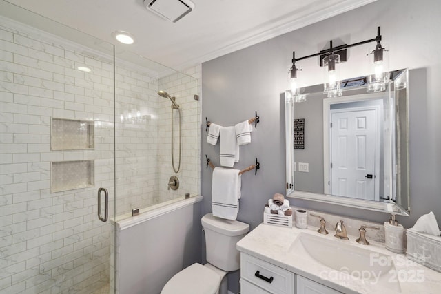 635 Portside Dr, Davidson, NC 28036 - bathroom with vanity, toilet, a shower stall, and crown molding