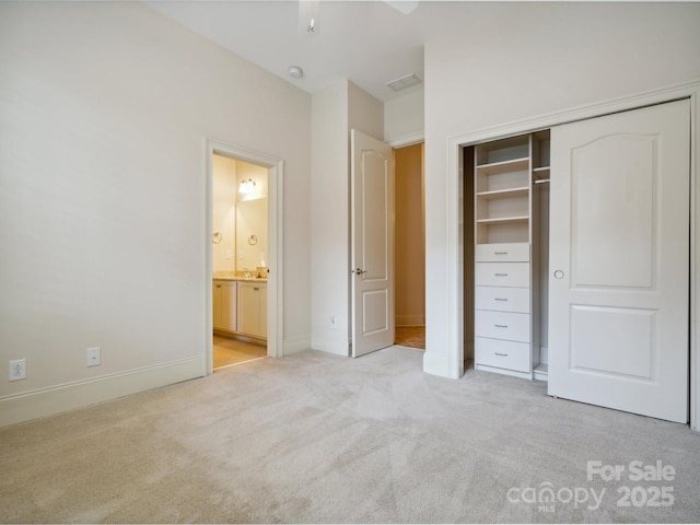 5805 Copperleaf Commons Ct, Charlotte, NC 28277 - unfurnished bedroom featuring light carpet, a closet, baseboards, and ensuite bathroom
