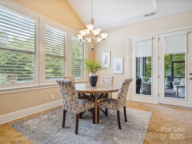 5805 Copperleaf Commons Ct, Charlotte, NC 28277 - dining space with a chandelier, healthy amount of natural light, vaulted ceiling, and tile patterned floors