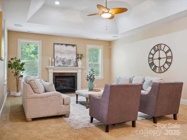 5805 Copperleaf Commons Ct, Charlotte, NC 28277 - living area featuring a tray ceiling, light colored carpet, ceiling fan, healthy amount of natural light, and recessed lighting