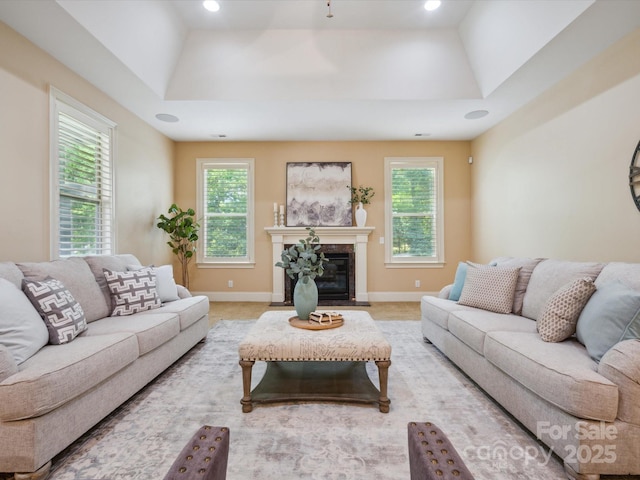 5805 Copperleaf Commons Ct, Charlotte, NC 28277 - living room with plenty of natural light, recessed lighting, a fireplace, and a tray ceiling