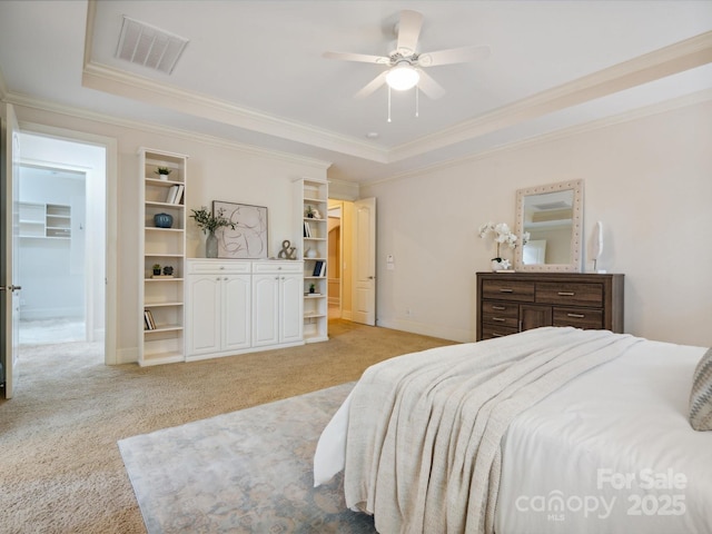 5805 Copperleaf Commons Ct, Charlotte, NC 28277 - bedroom featuring ornamental molding, a tray ceiling, light colored carpet, a spacious closet, and ceiling fan
