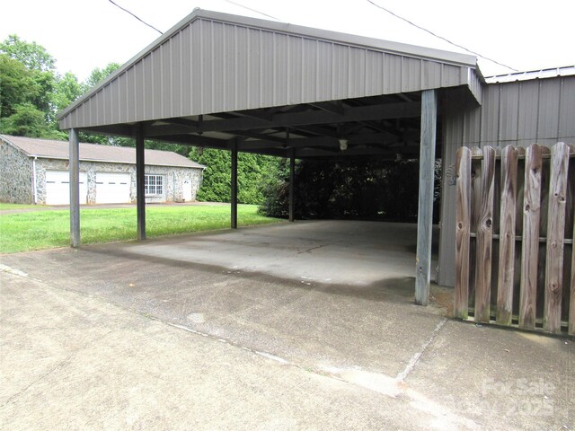 3838 Cliffside Rd, Mooresboro, NC 28114 - view of parking with concrete driveway and a carport