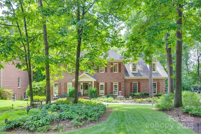 10215 Balmoral Cir, Charlotte, NC 28210 - colonial inspired home featuring brick siding and a front yard